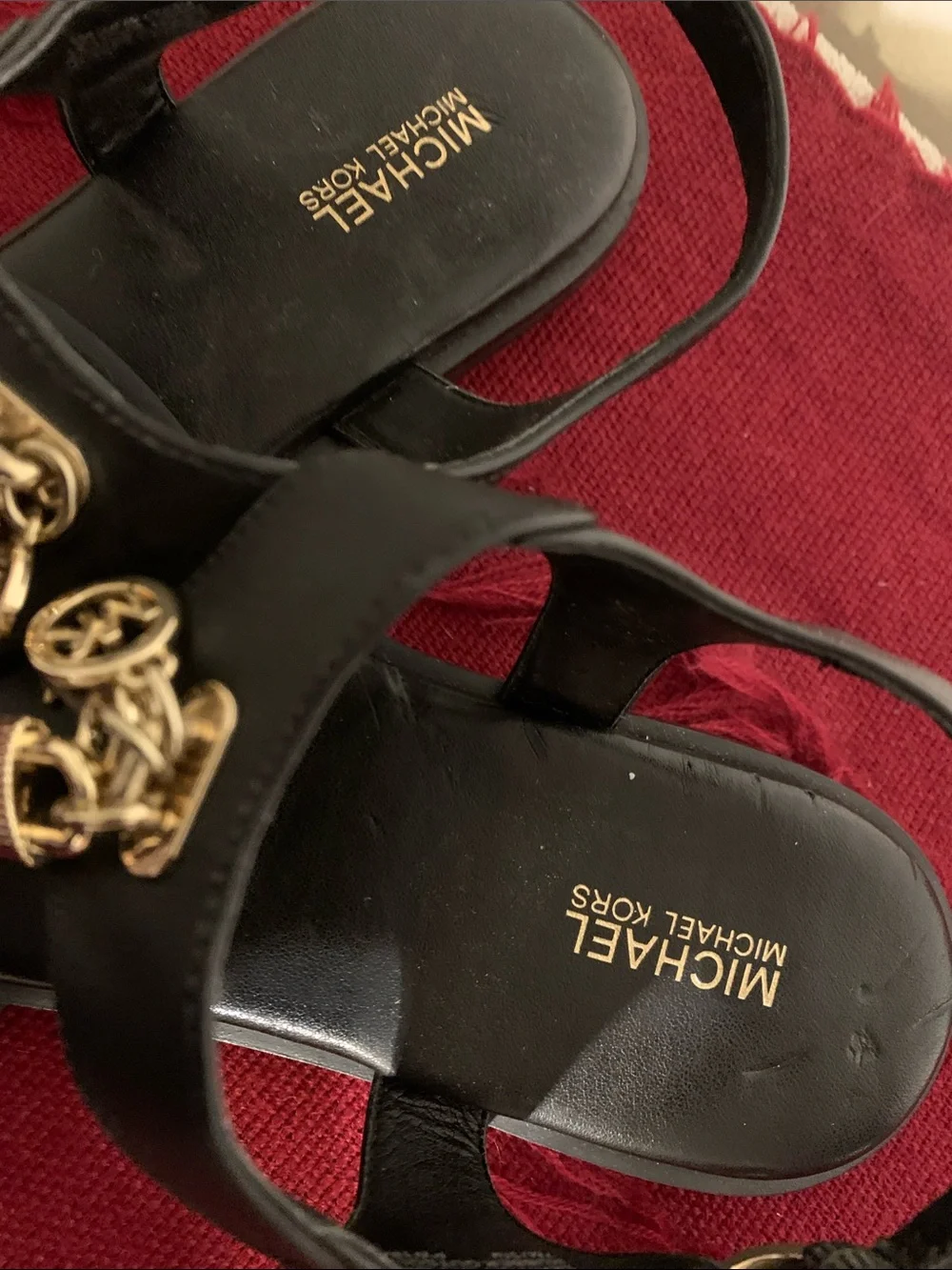 Michael Kors Black Leather Thong Sandals with Gold Padlock Charms